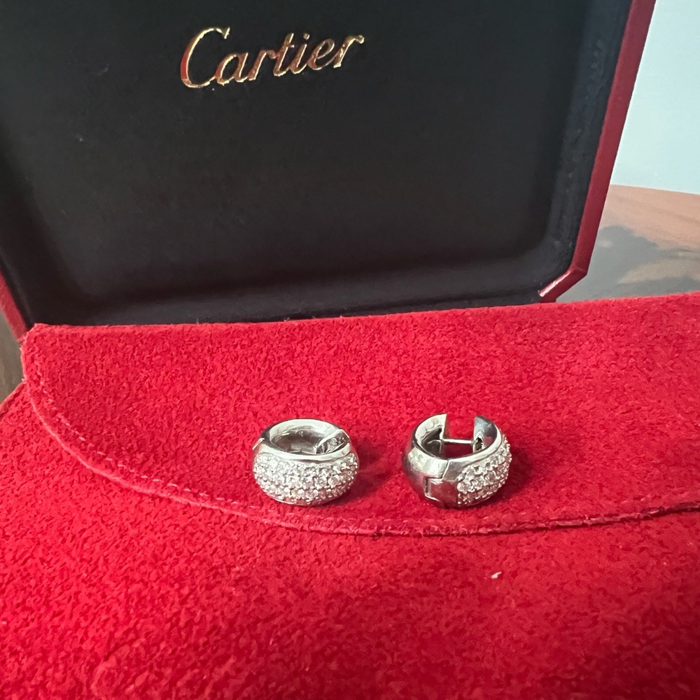 Authentic Cartier two platinum earrings containing round brilliant-cut diamonds